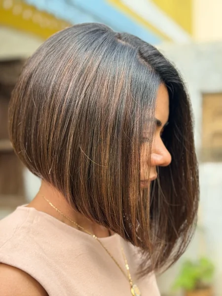 Sun-Kissed Brunette Angled Bob