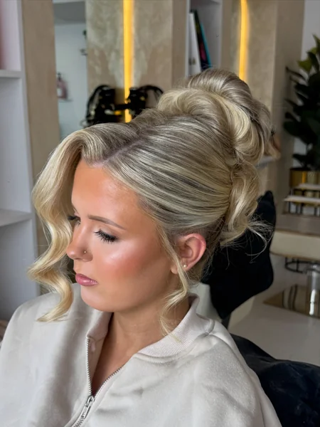 Sleek High Bun with Face Waves