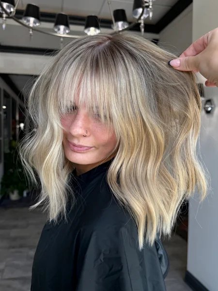 Long Choppy Blonde Bob with Bangs