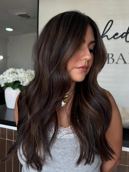 Long Layered Waves with Warm Balayage