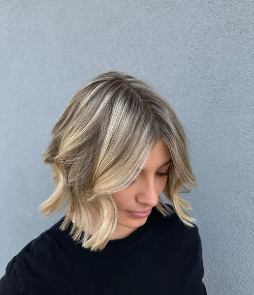 Bright Blonde Flicked Bob