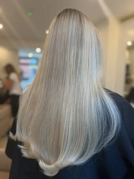 Sleek Icy Blonde with Curved Ends
