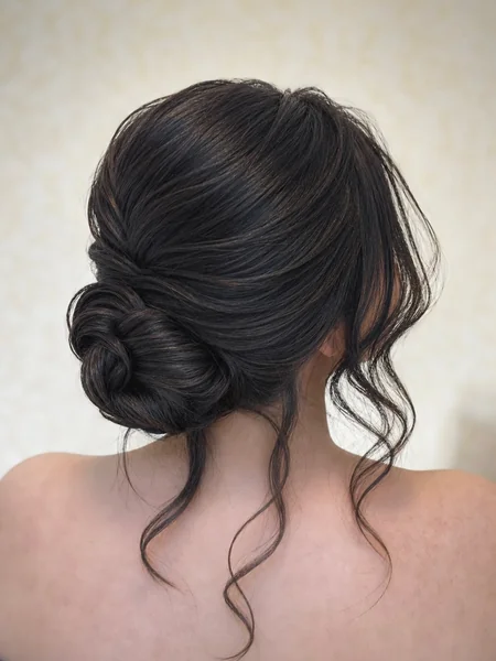 Low Chignon with Tendrils
