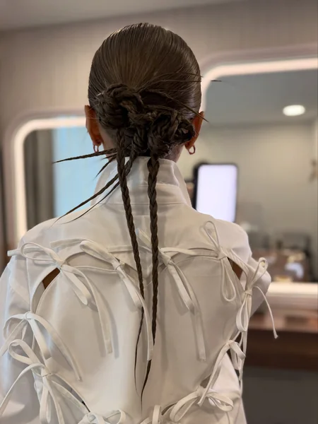 Slick Low Bun with Micro Braids