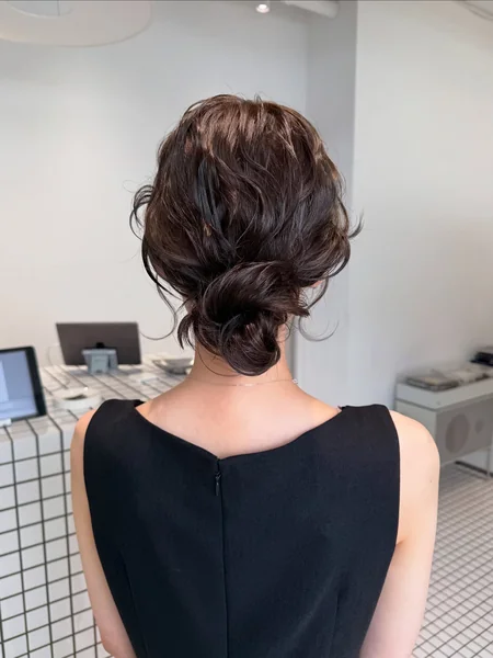 Shoulder Length Wavy Low Bun