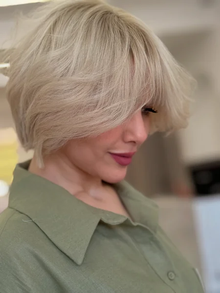 Layered Ash Blonde Pixie Bob With Bangs