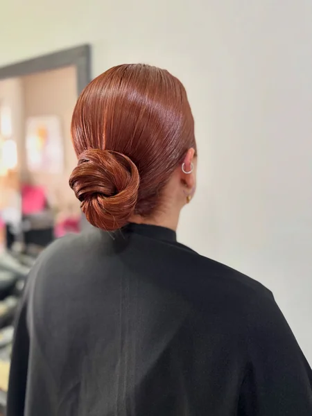 Sleek Knotted Low Chignon