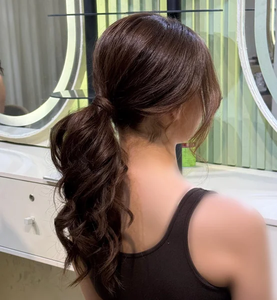 Curled Low Ponytail