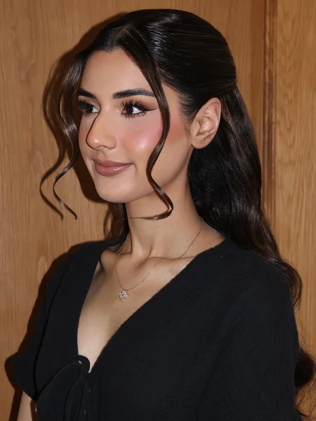 Sleek Back with Curled Tendrils