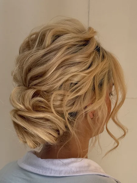 Voluminous Textured Wavy Updo