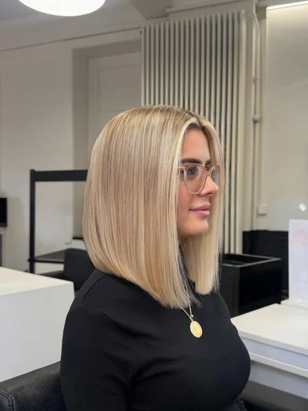Sleek Blonde Angled Lob