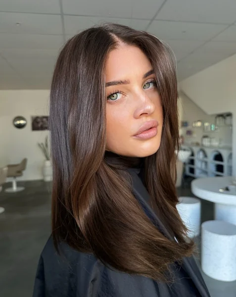 Long Brunette Waves with Subtle Highlights