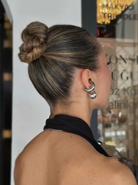 Twisted Top Bun with Bold Earrings