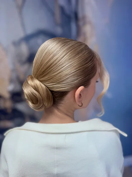 Blonde Low Swirl Bun