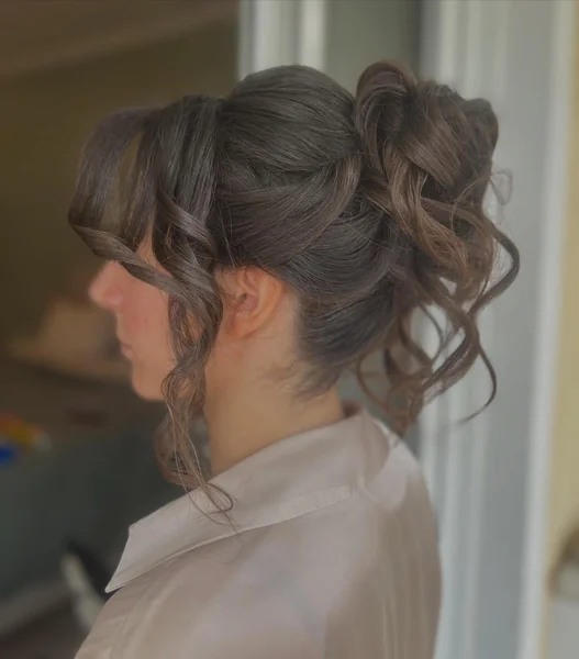 Romantic High Updo with Curled Fringe