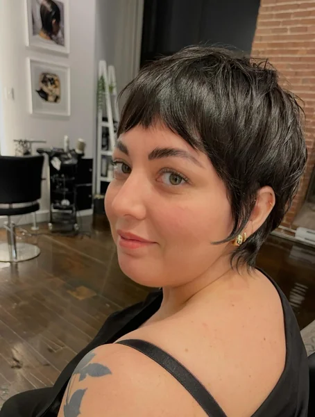 Glossy Black Pixie With Wispy Bangs