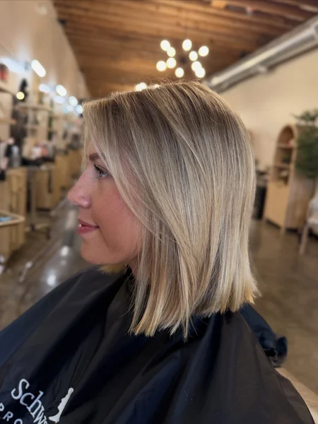 Golden Balayage Blunt Bob With Side Bangs