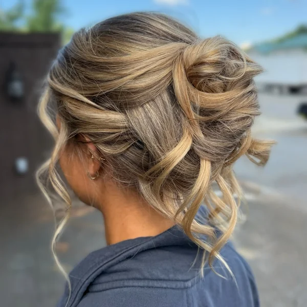 Messy Twisted Updo with Loose Curls