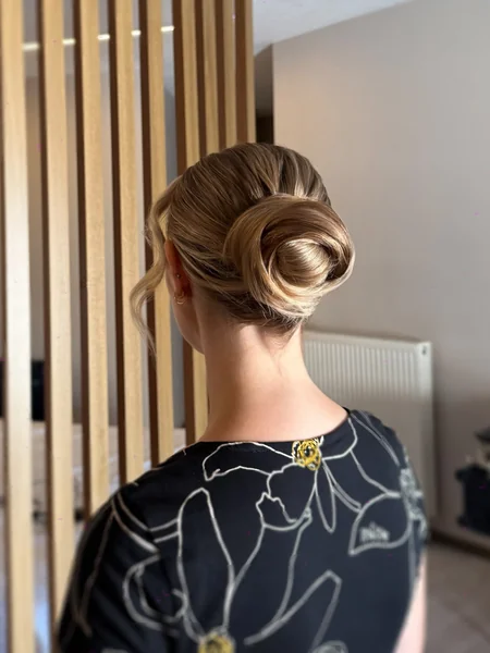 Swirled Side Bun with Soft Tendrils