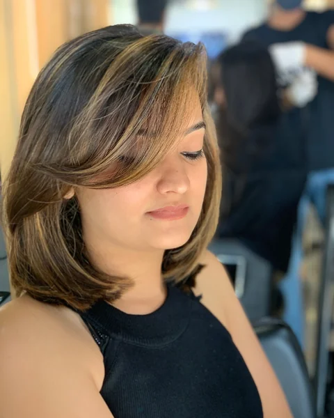 Side-Swept Lob with Caramel Highlights