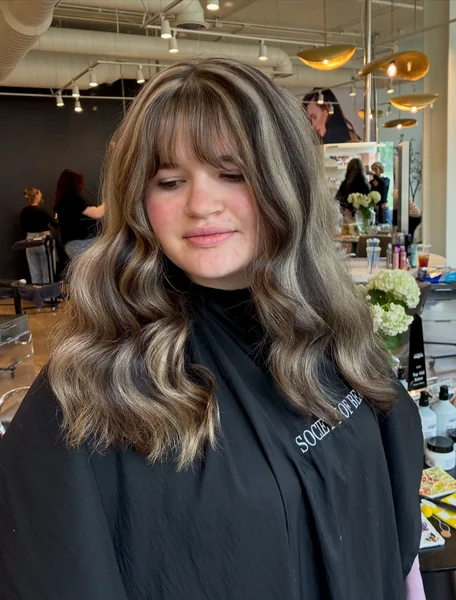 Wispy Bangs with Blonde Highlights
