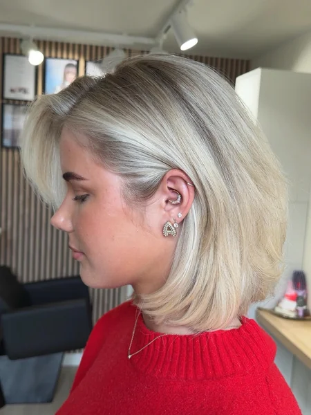 Voluminous Layered Ash Blonde Bob