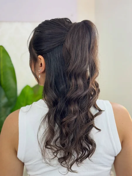 Half-Up Ponytail with Tousled Waves