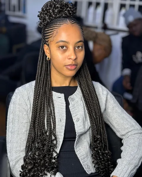 Half-Up Curly Bun With Cornrows