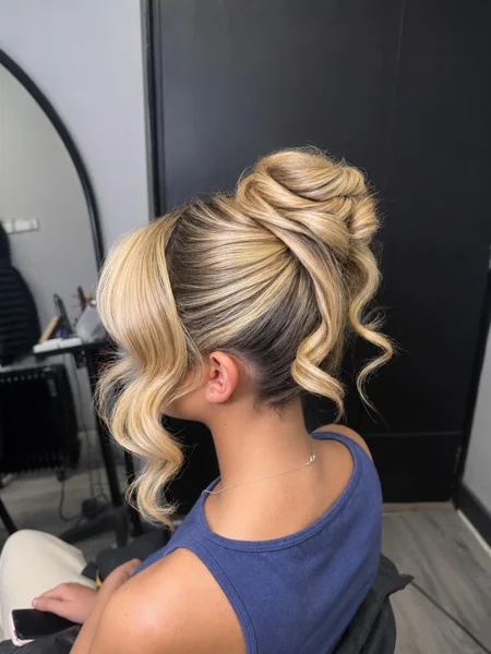 High Twisted Updo with Curls