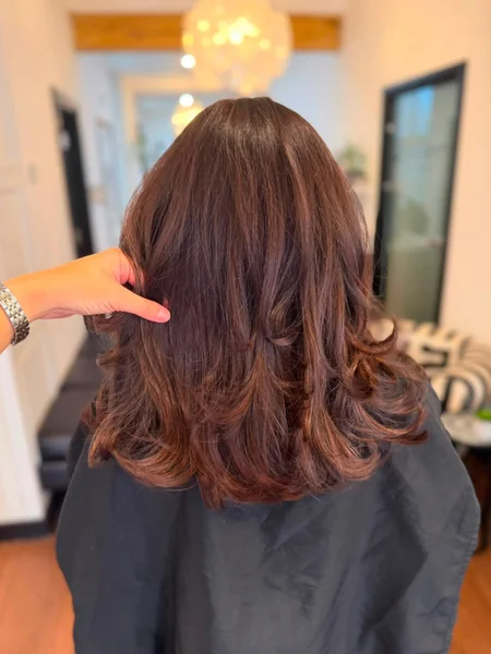 Bouncy Brunette Mid-Length Blowout