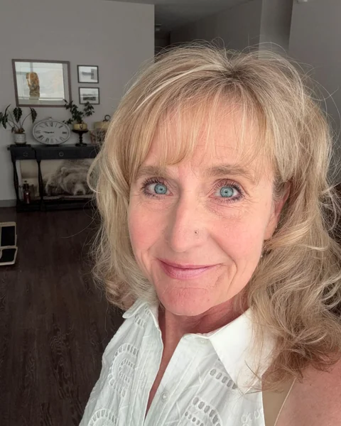 Curly Blonde Cut with Bangs