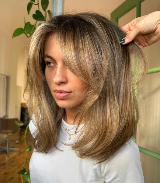 Shaggy Bronde Layers with Curtain Bangs