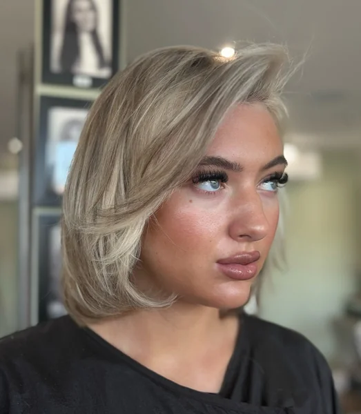 Layered Ash Blonde Bob With Face Framing Layers