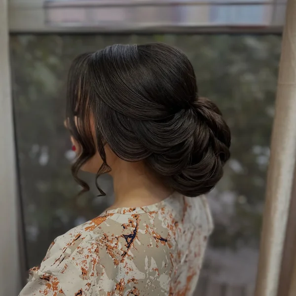 Low Chignon with Bangs