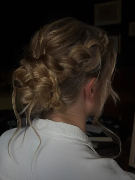 Loose Dutch Braid Messy Bun