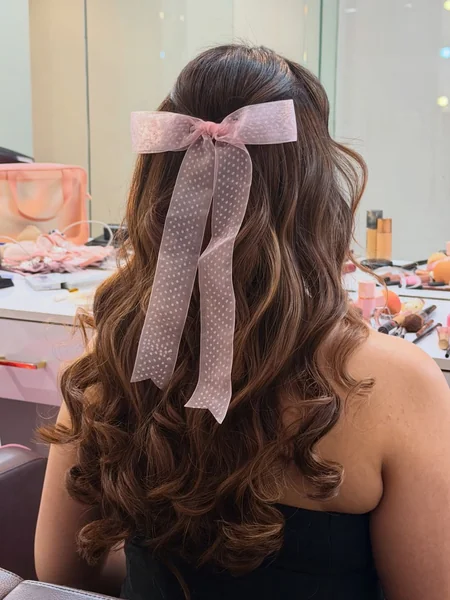 Half-Down Curls with Pink Bow