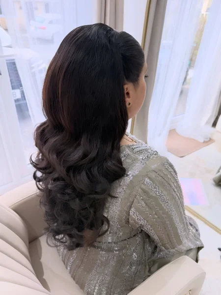 Swept-Back Voluminous Curls