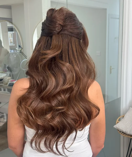 Twisted Half-Up with Voluminous Waves