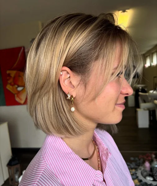 Sleek Blonde Bob with Wispy Fringe