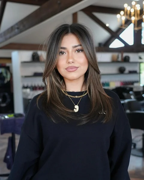 Sleek Medium Brunette with Subtle Highlights