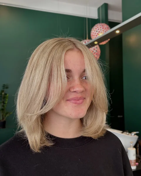 Buttery Blonde Bob with Curtain Bangs
