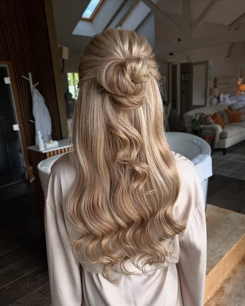 Half-Up Bun with Brushed-Out Waves