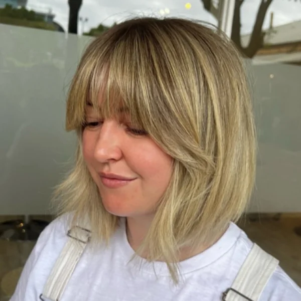 Shoulder-Length Blonde Bob with Bangs