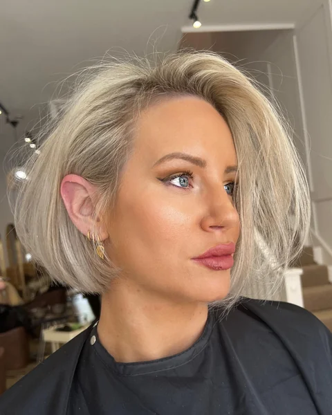 Messy Ash Blonde Bob With Side Sweep