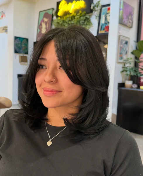 Feathered Black Lob with Curtain Bangs