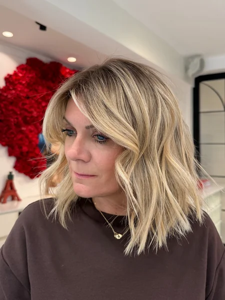 Layered Blonde Lob with Side Bangs