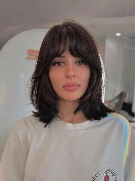 Shoulder-Skimming Lob with Full Bangs