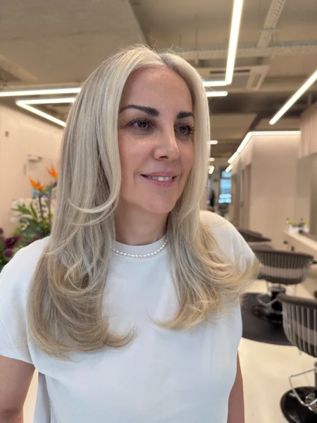 Soft Platinum Layers for Mature Hair