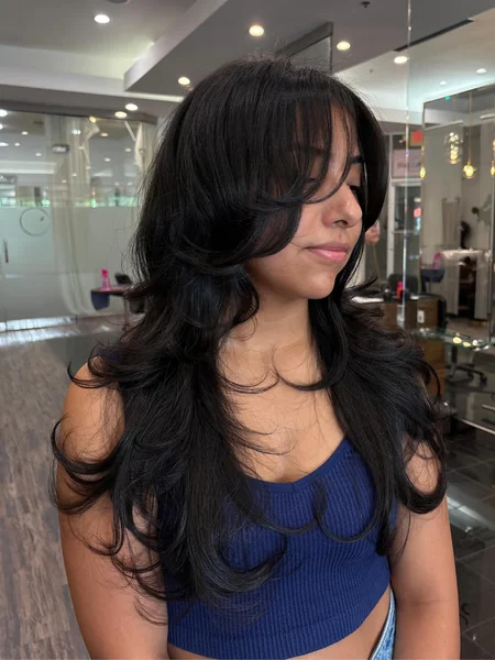 Shaggy Long Black Layers with Bangs