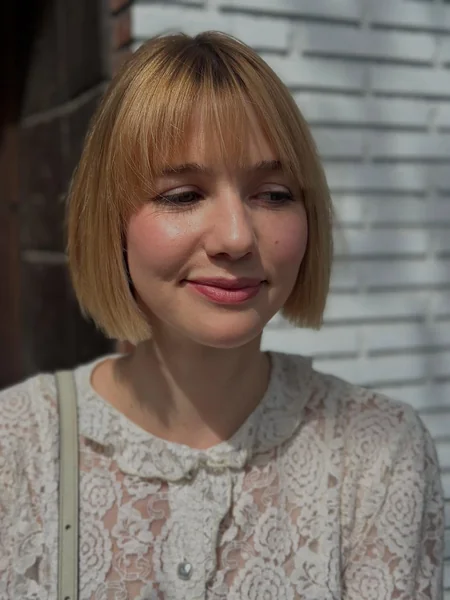 Strawberry Blonde Bob with Blunt Bangs